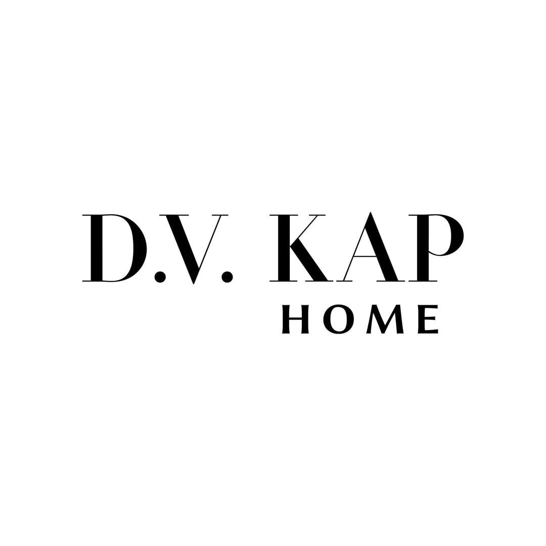 D.V. Kap Home luxury pillows and blankets collection showcasing elegant designs and premium craftsmanship.
