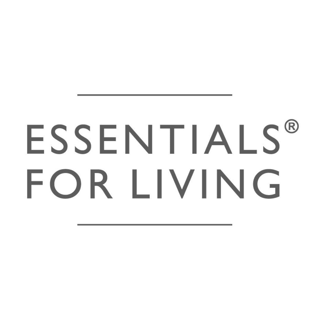 Essentials for Living dining table and accent chairs in modern home interior.