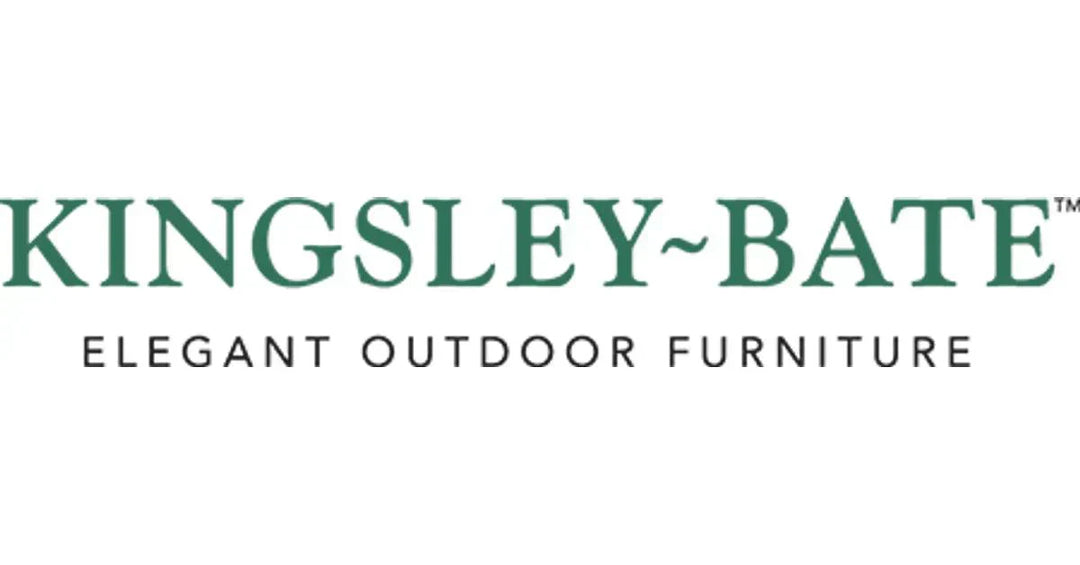 Elegant Kingsley Bate outdoor furniture set featuring teak dining table and aluminum chairs on a stylish patio.