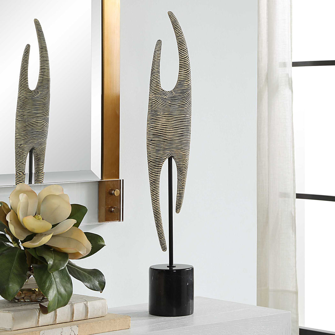 American Home Furniture Uttermost Pochette Ribbed Sculpture