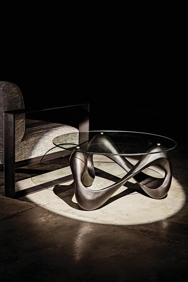 American Home Furniture | Noir - Orion Coffee Table, Black Resin Cement with Glass