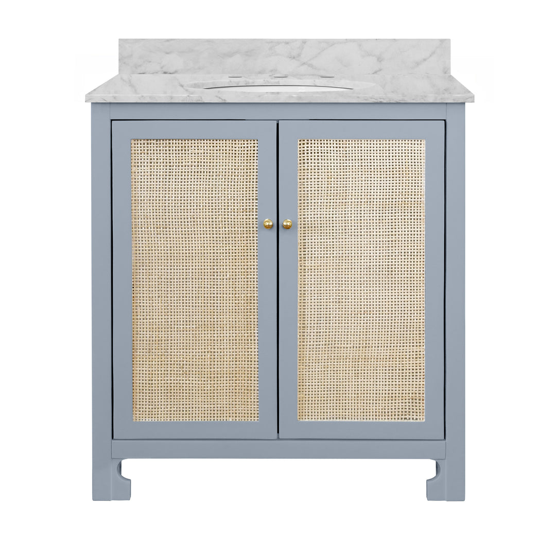 Bath Vanity In Matte Light Blue Lacquer With Cane Front Doors, White Marble Top, Porcelain Sink, And Polished Brass Knobs - BOYD LB