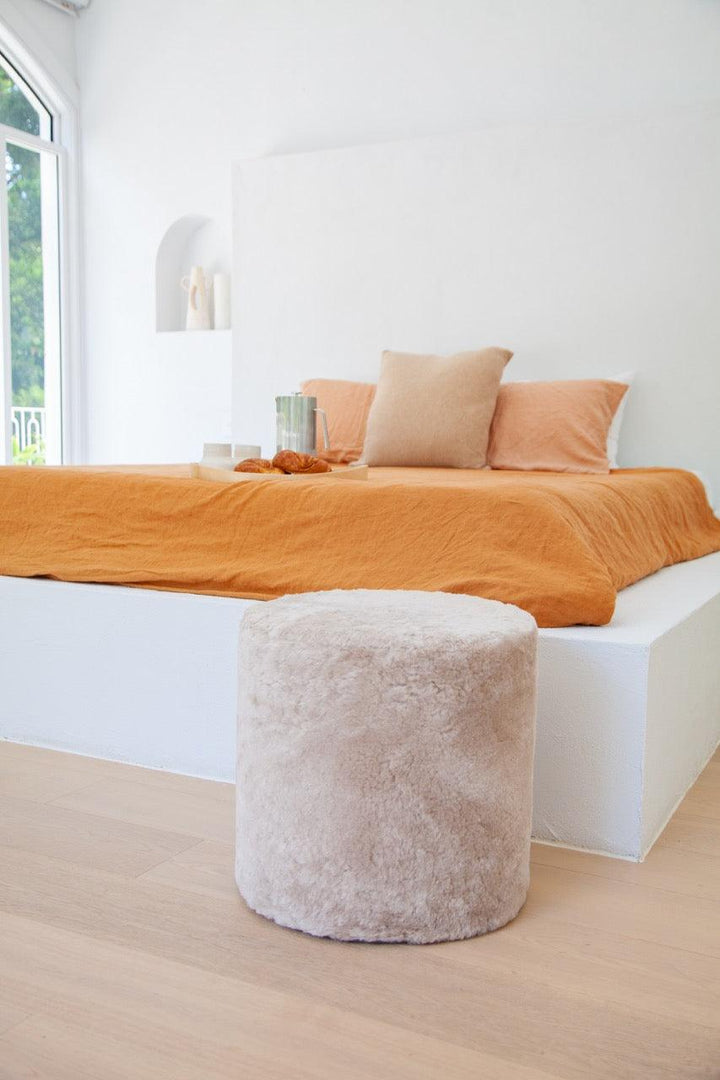 Tall Shearling Round Ottoman - AmericanHomeFurniture