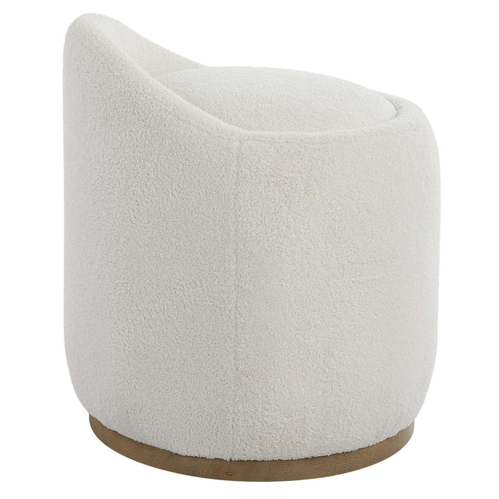 American Home Furniture Uttermost Swirl Swivel Sheepskin Ottoman