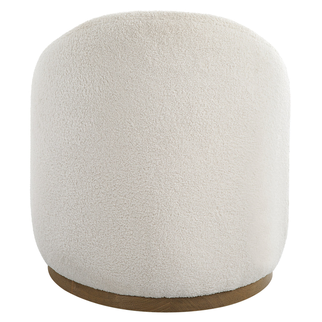 American Home Furniture Uttermost Swirl Swivel Sheepskin Ottoman