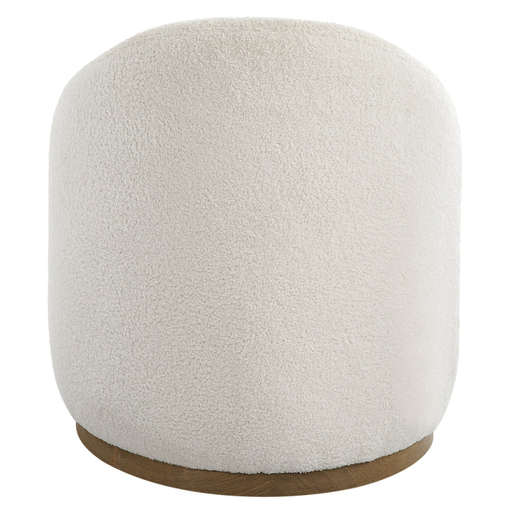American Home Furniture Uttermost Swirl Swivel Sheepskin Ottoman