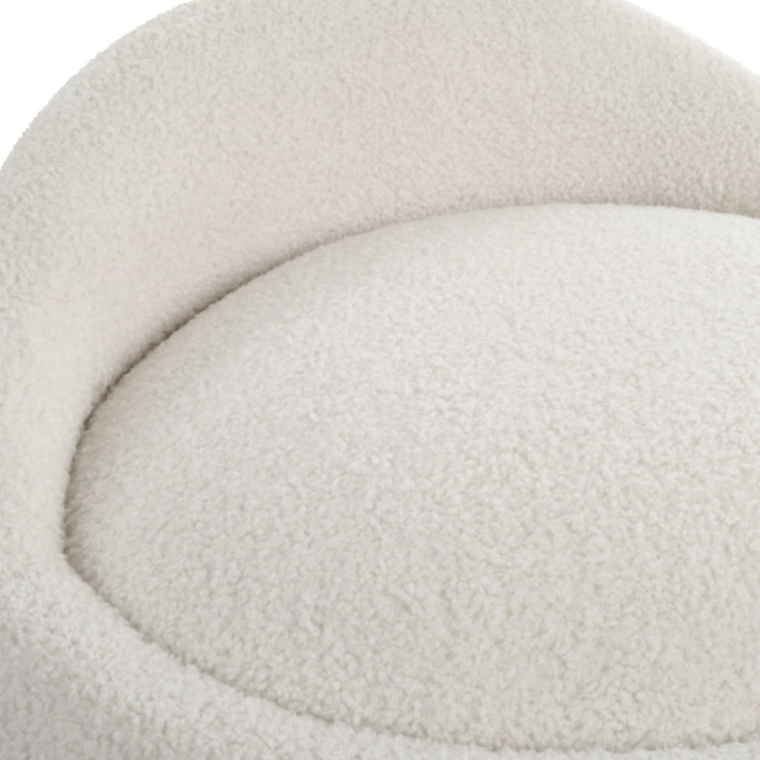 American Home Furniture Uttermost Swirl Swivel Sheepskin Ottoman