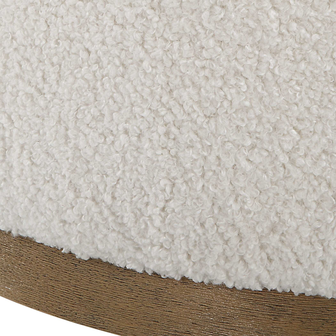 American Home Furniture Uttermost Swirl Swivel Sheepskin Ottoman