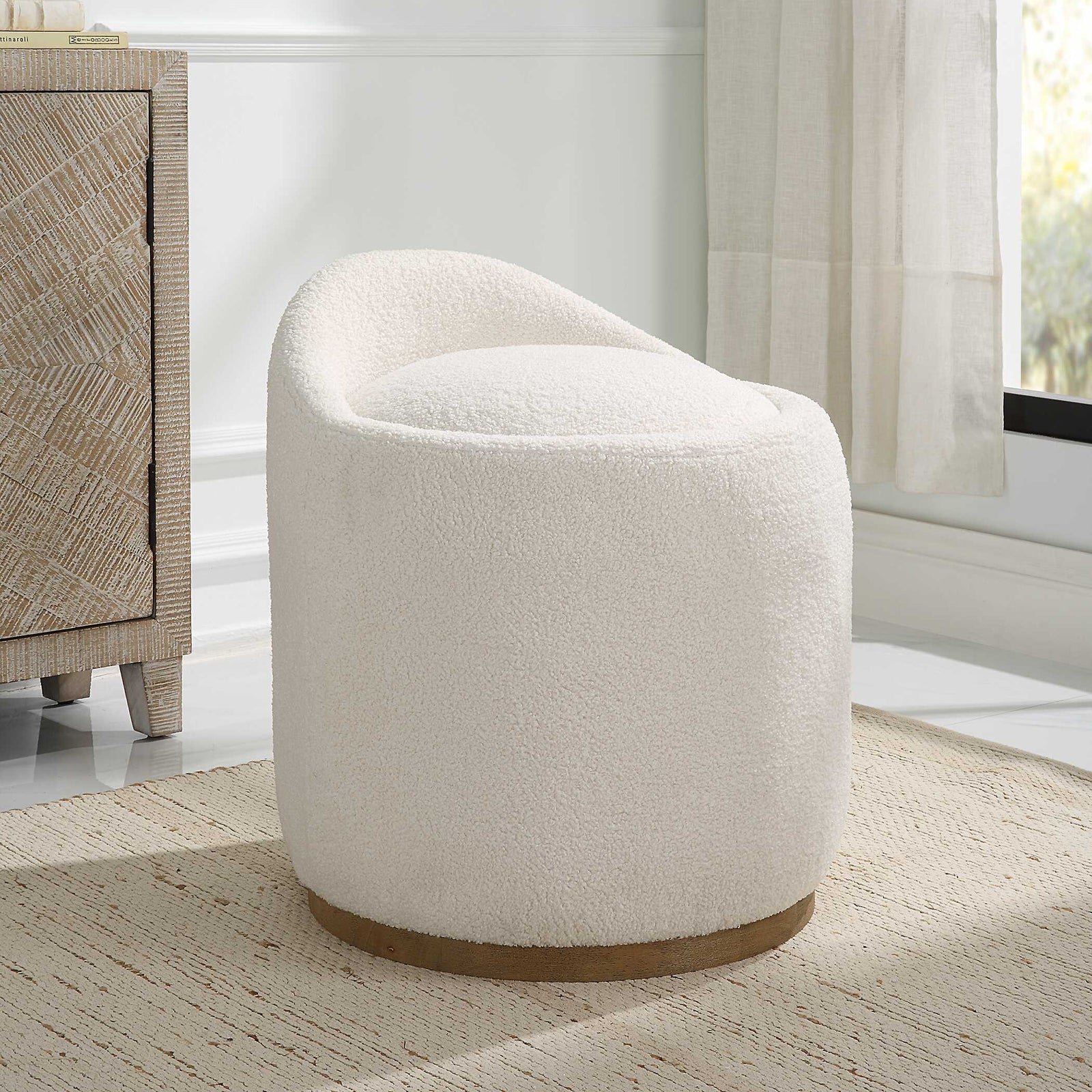 American Home Furniture Uttermost Swirl Swivel Sheepskin Ottoman