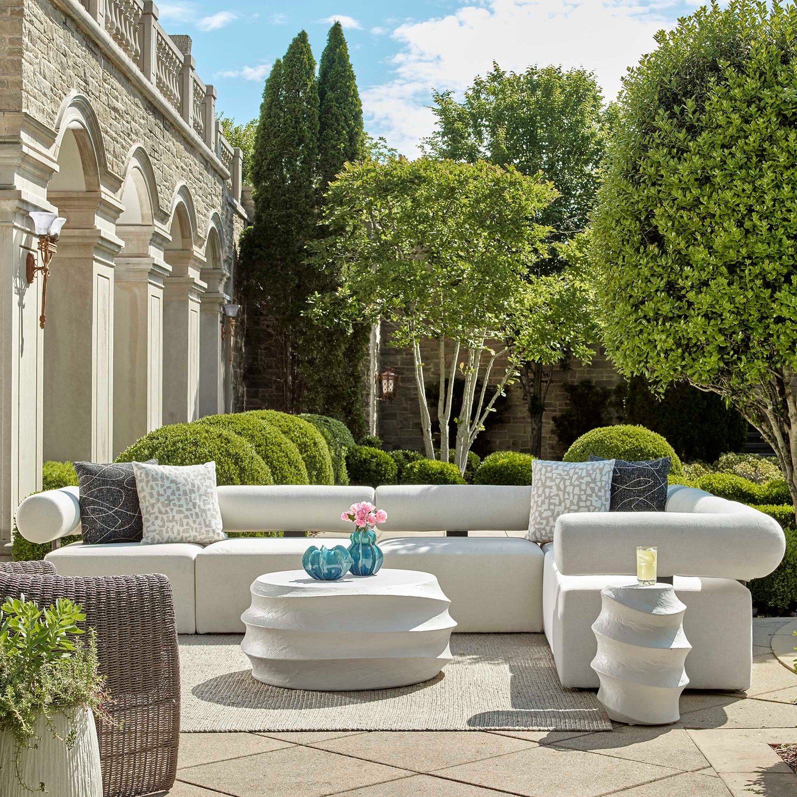 American Home Furniture Uttermost Bolster Back White Armless Outdoor Sofa