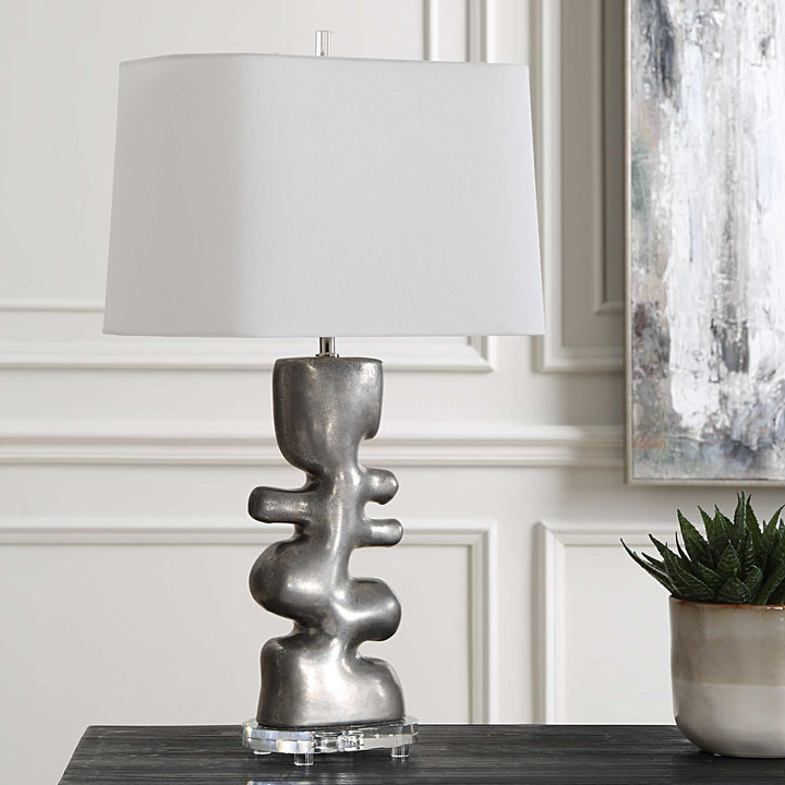 American Home Furniture Uttermost Free Flowing Nickel Table Lamp