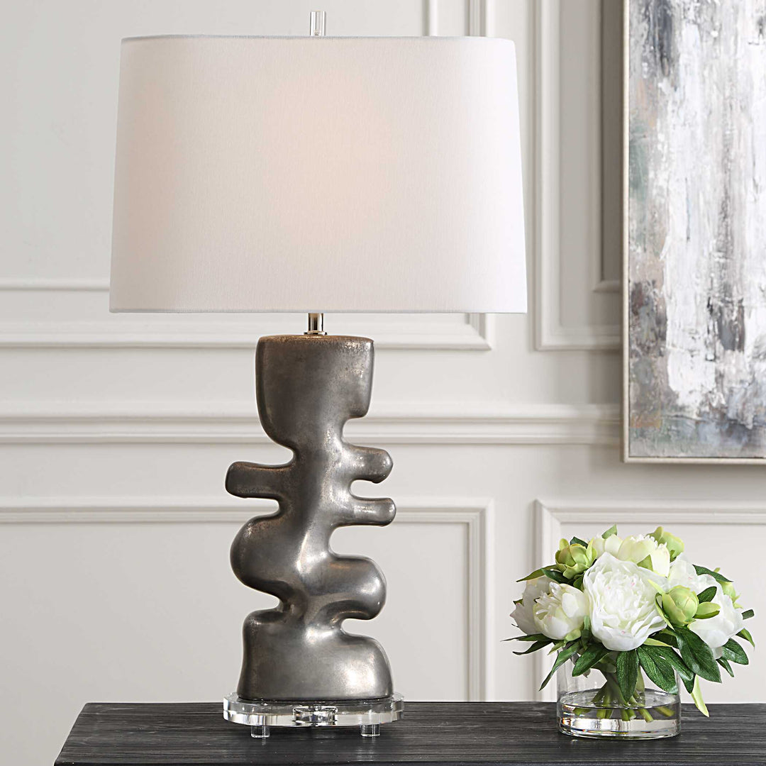 American Home Furniture Uttermost Free Flowing Nickel Table Lamp