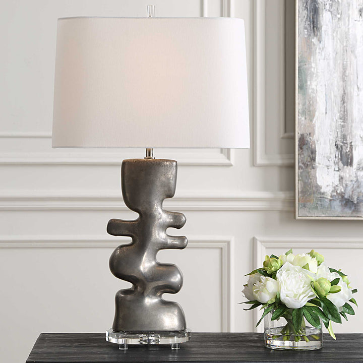 American Home Furniture Uttermost Free Flowing Nickel Table Lamp