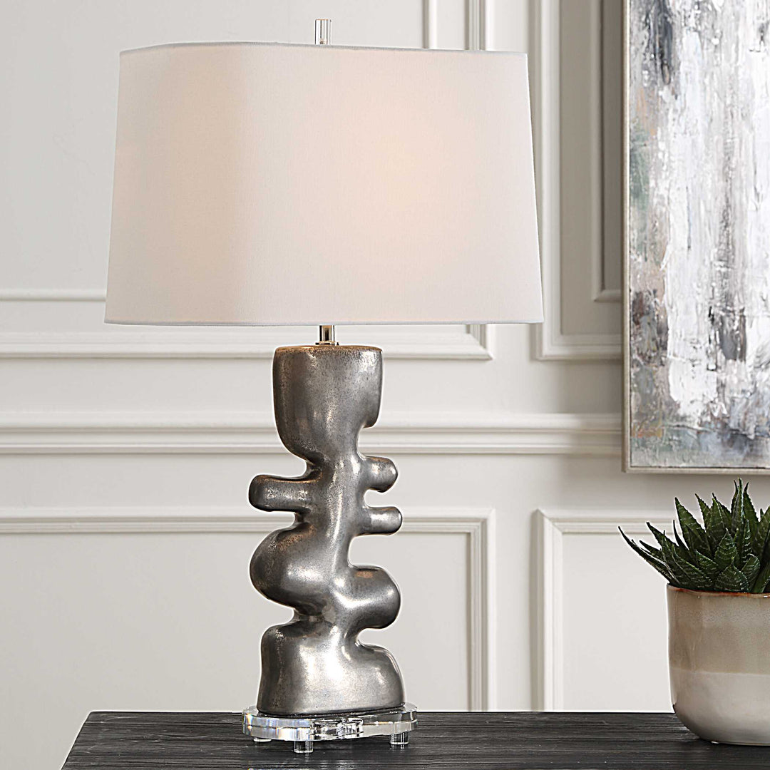 American Home Furniture Uttermost Free Flowing Nickel Table Lamp