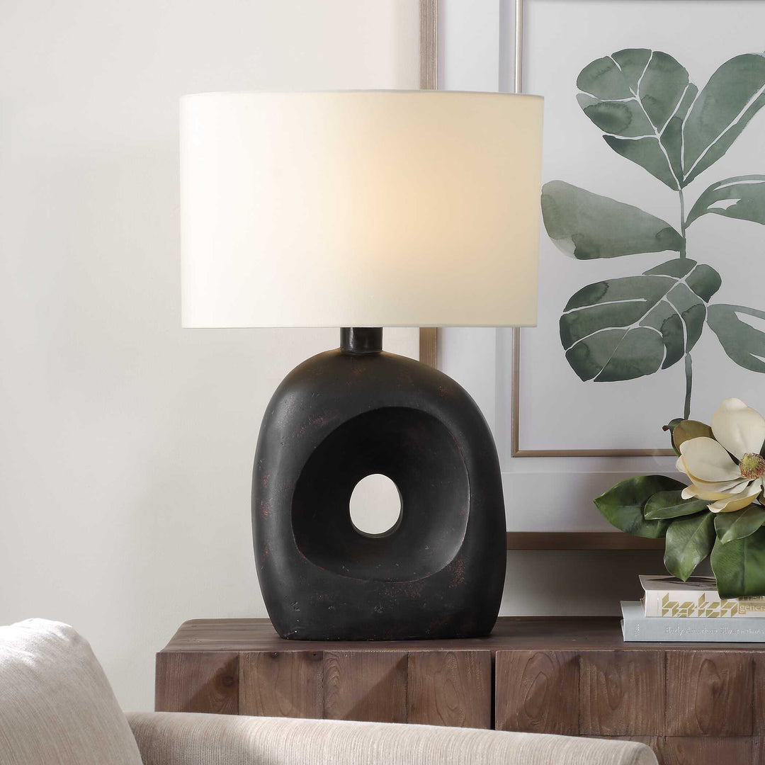American Home Furniture Uttermost Peephole Outdoor Bronze Table Lamp
