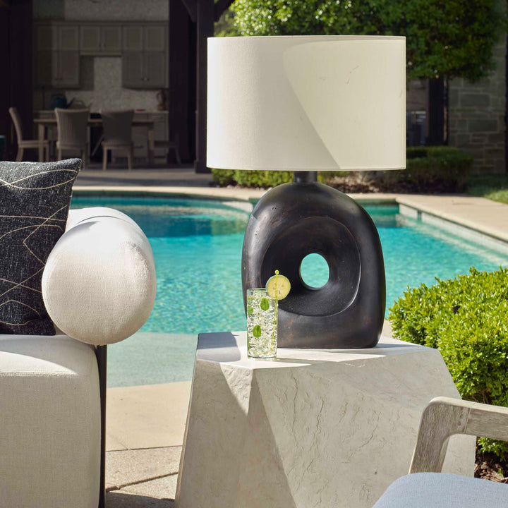 American Home Furniture Uttermost Peephole Outdoor Bronze Table Lamp