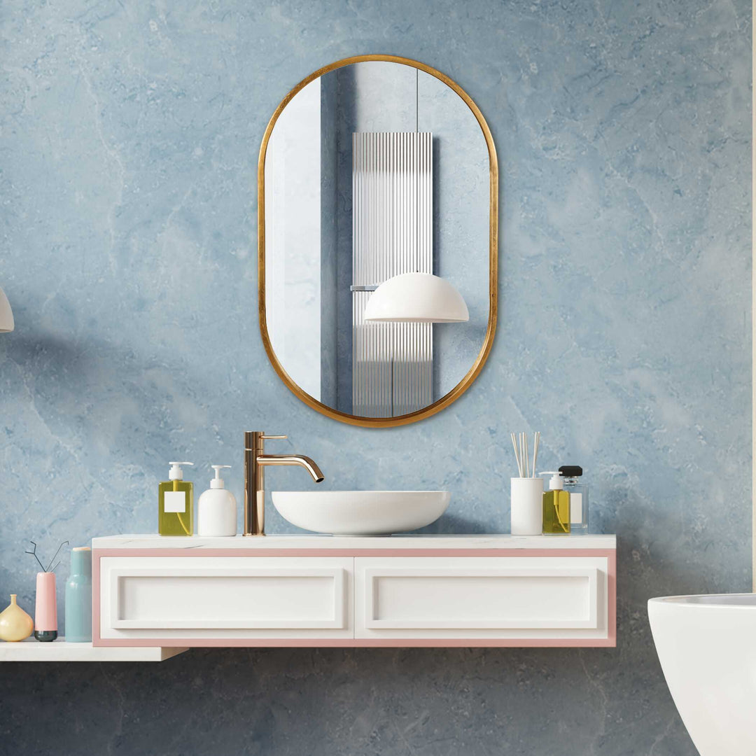 American Home Furniture Uttermost Varina Minimalist Gold Oval Mirror