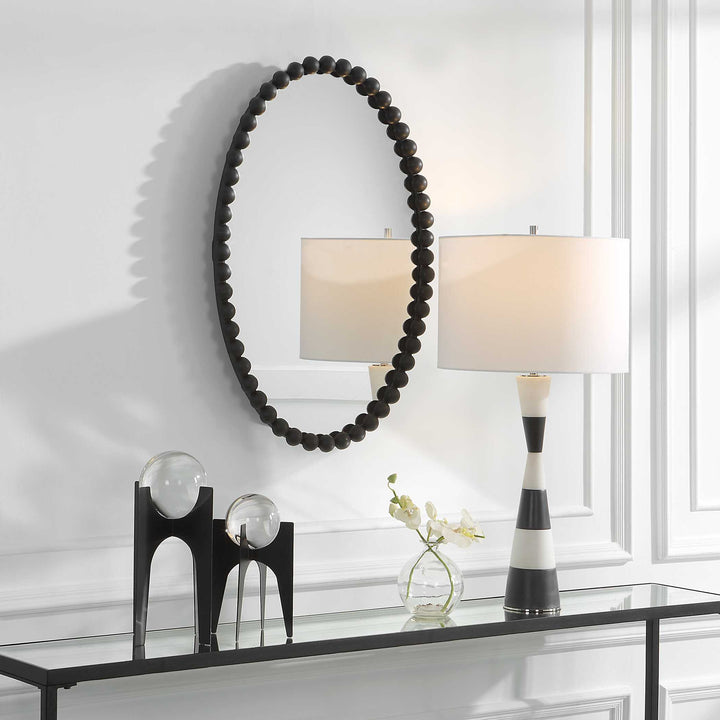 American Home Furniture Uttermost Serna Black Oval Mirror