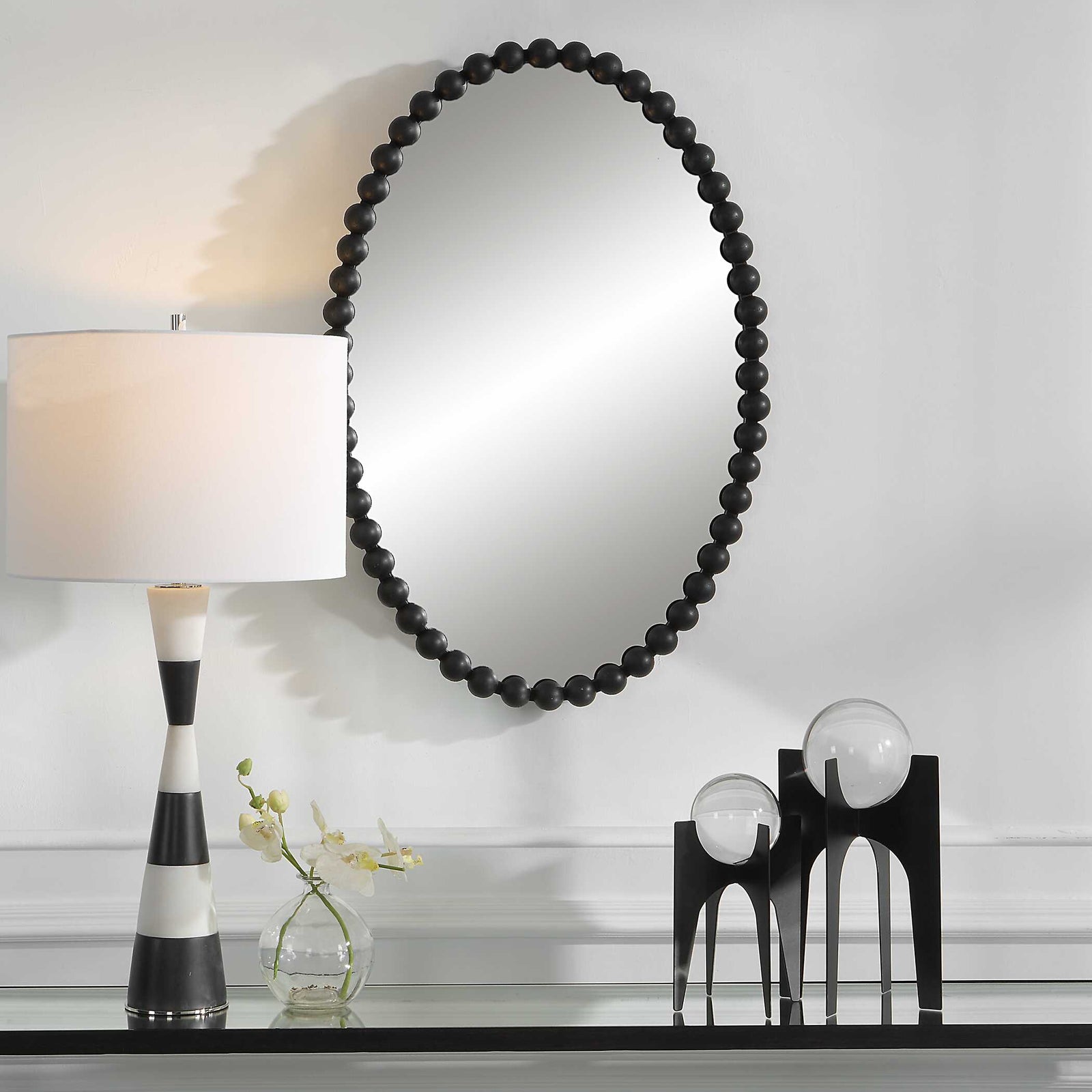 American Home Furniture Uttermost Serna Black Oval Mirror