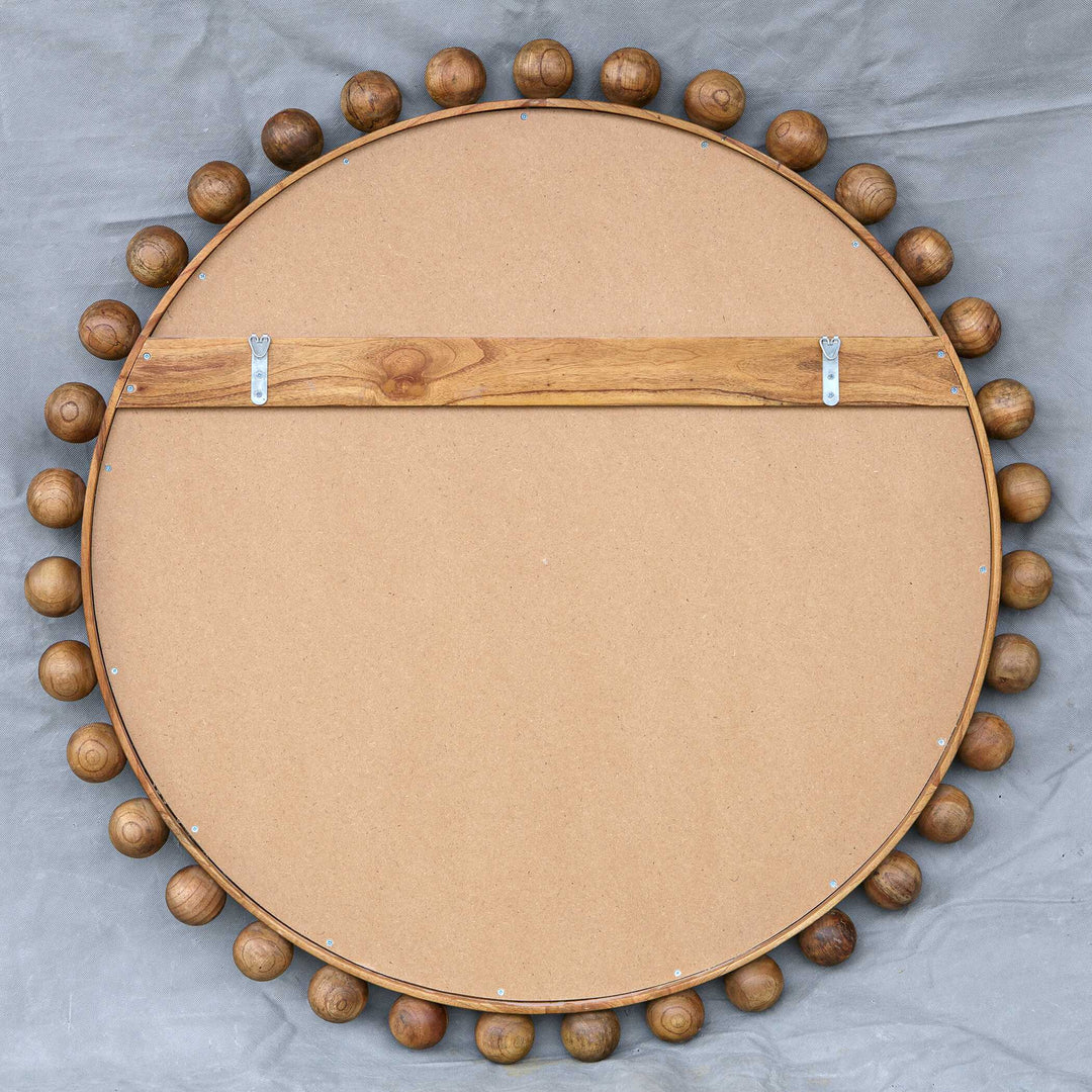 American Home Furniture Uttermost Cyra Wood Beaded Round Mirror
