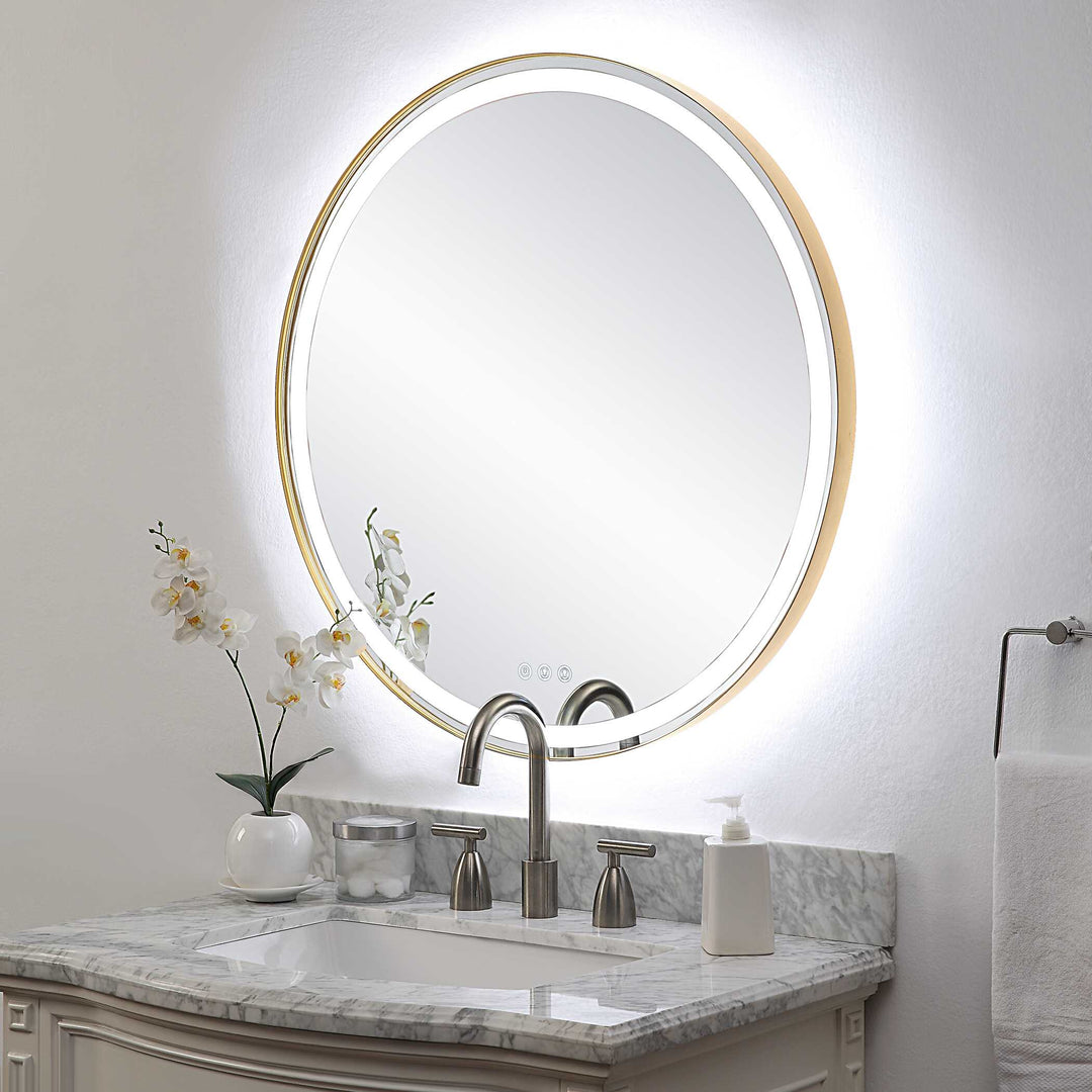 American Home Furniture Uttermost Crofton Lighted Brass Round Mirror
