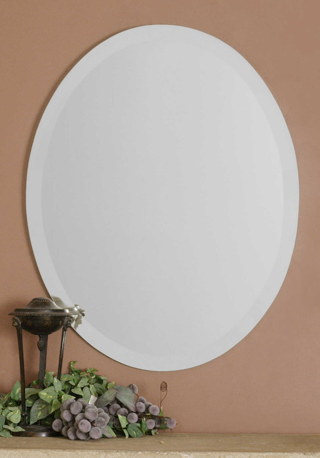 American Home Furniture Uttermost Frameless Vanity Oval Mirror