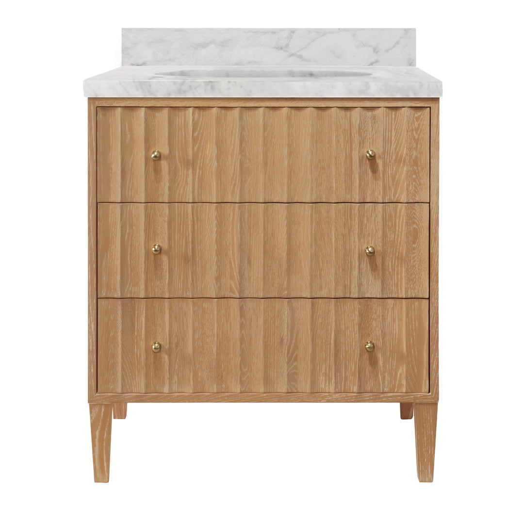 Bath Vanity With Vertical Fluted Detail On Drawers In Cerused Oak With White Marble Top, Porcelain Sink, And Polished Brass Knobs - ODIN CO