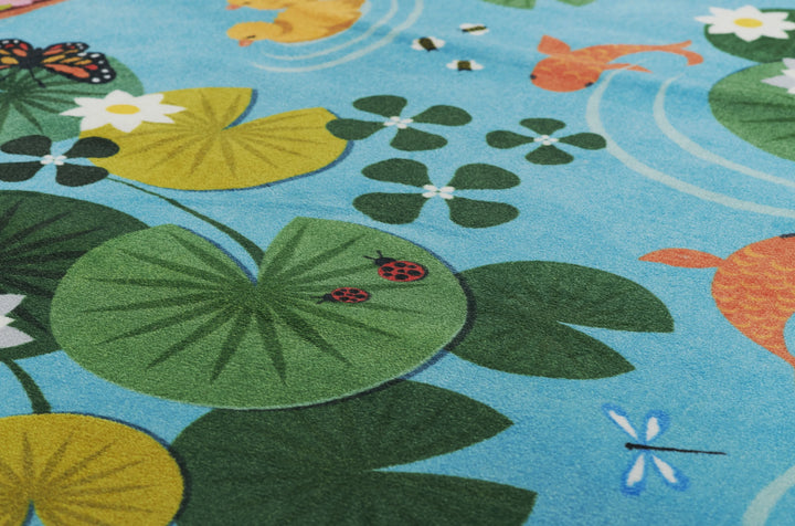 American Home Furniture Momeni Playground Pond Rug