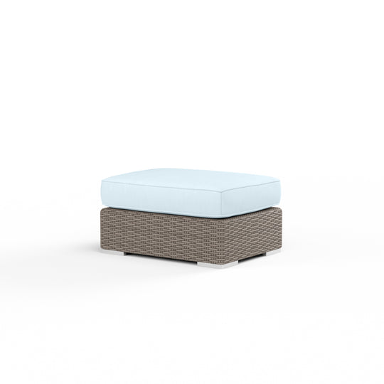 Coronado Ottoman in Canvas Skyline w/ Self Welt