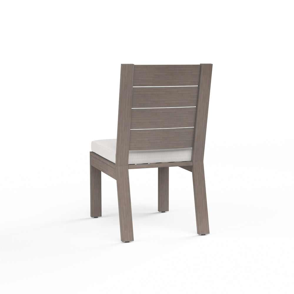 American Home Furniture | Sunset West - Laguna Armless Dining Chair in Canvas Flax, No Welt