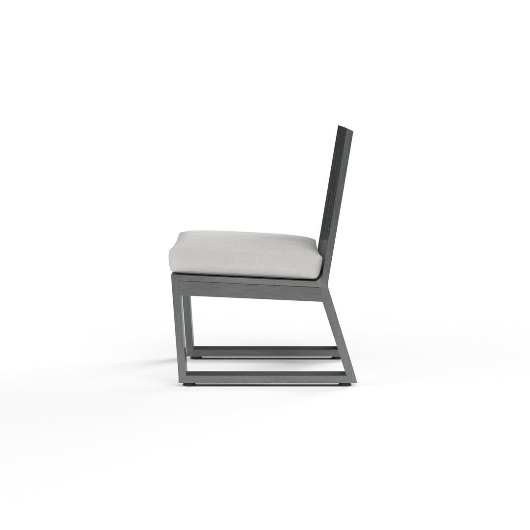 American Home Furniture | Sunset West - Redondo Armless Dining Chair in Cast Silver, No Welt