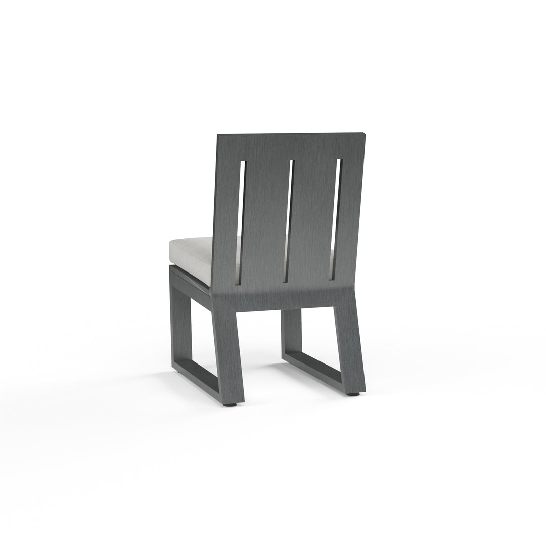 American Home Furniture | Sunset West - Redondo Armless Dining Chair in Cast Silver, No Welt