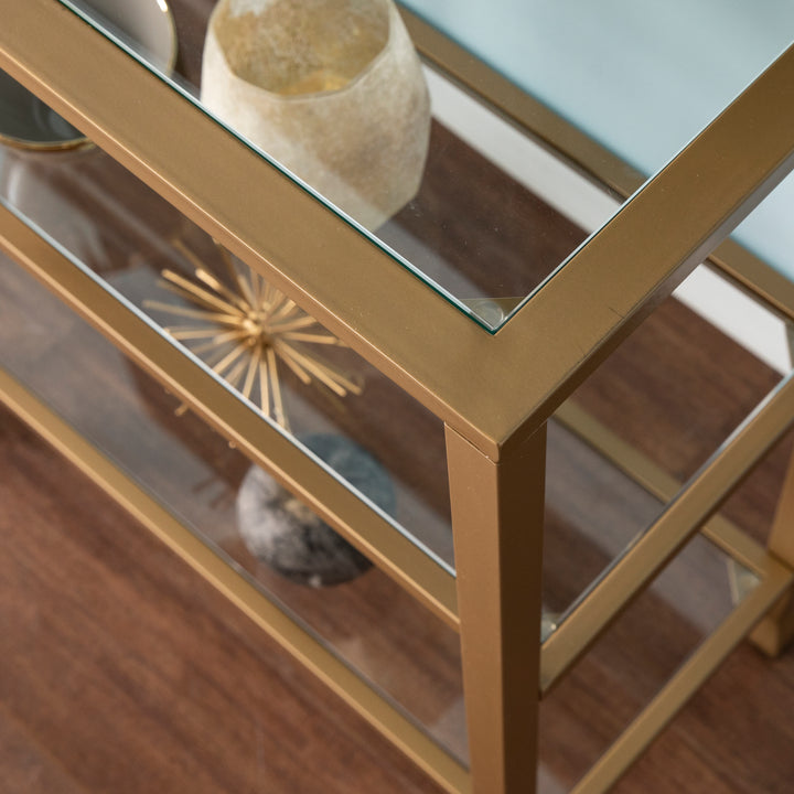 American Home Furniture | SEI Furniture - Jaymes Narrow Metal Console Table w/ Glass Shelves - Gold