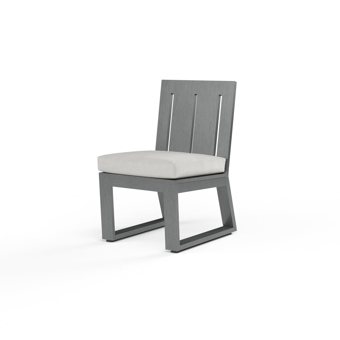 American Home Furniture | Sunset West - Redondo Armless Dining Chair in Cast Silver, No Welt