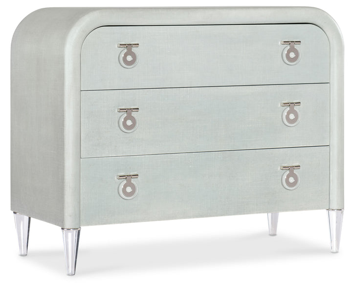 Light seafoam green linen exterior with clear acrylic legs and silver chrome-colored metal accents. Hardware is clear acrylic and chrome-colored metal drop pulls.