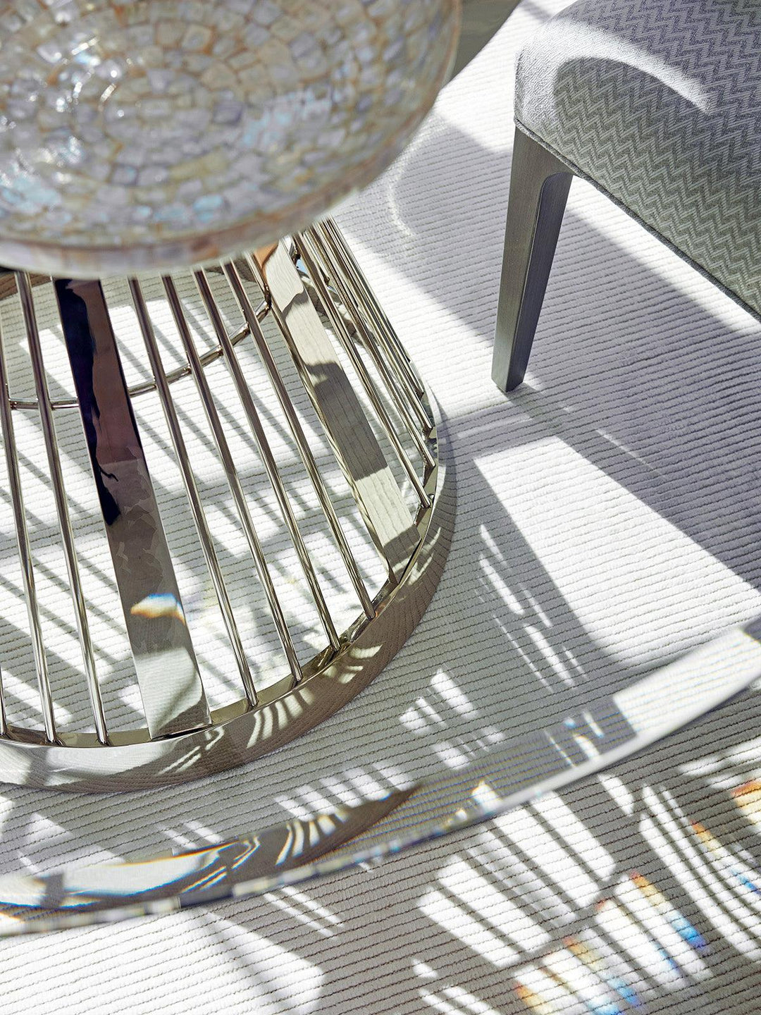 Ariana Riviera Stainless Dining Table With 54 Inch Glass Top - AmericanHomeFurniture